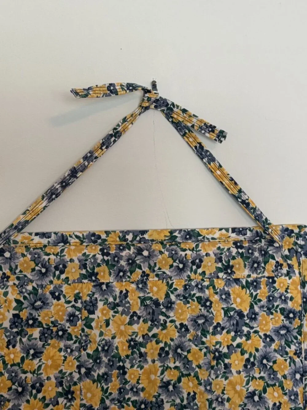 Denim quilt wall organizer with 4 pockets & 6 belt loops
